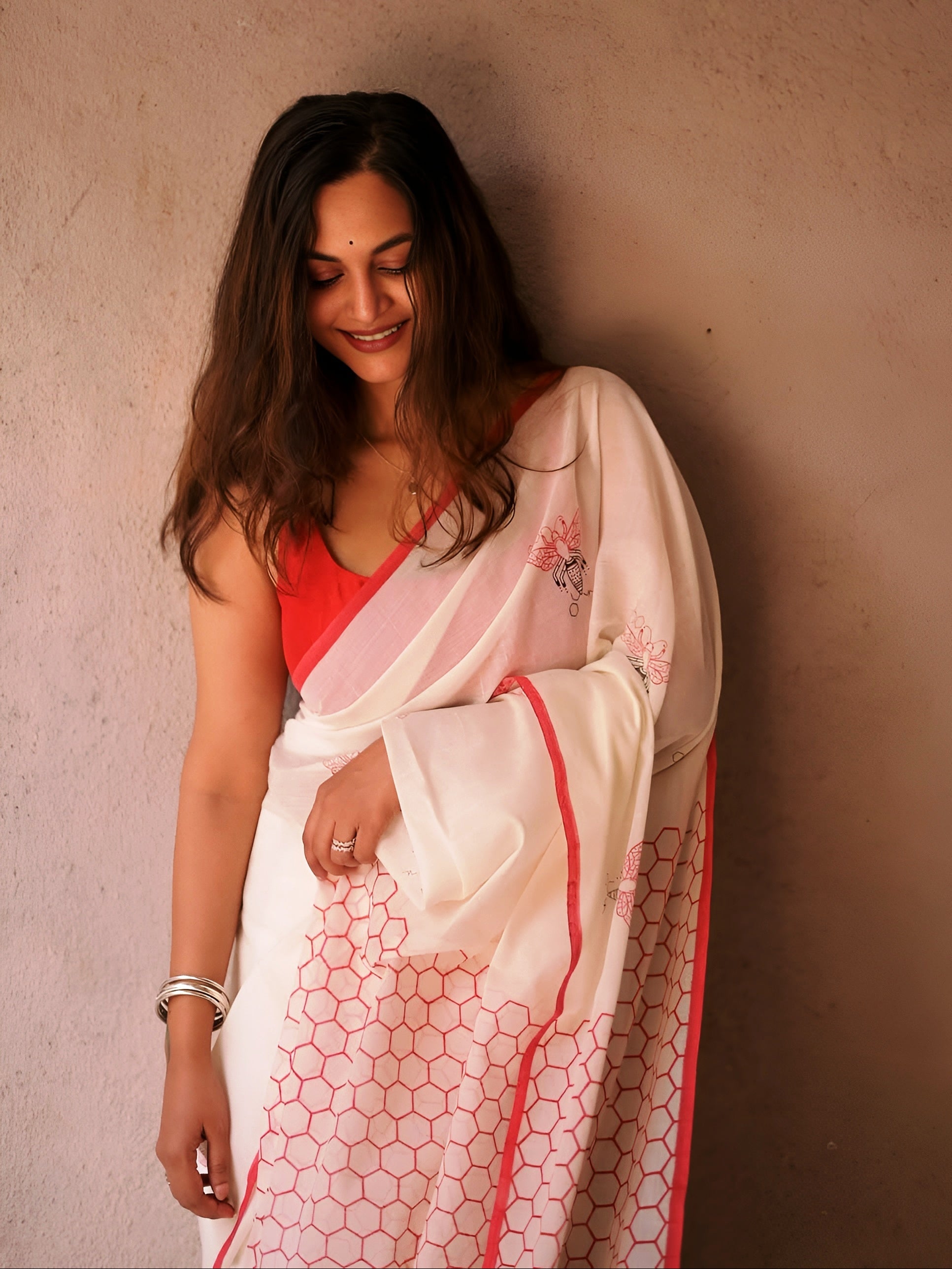 Elegant Cream Linen Saree with Minimal Floral Print & Contrast Border