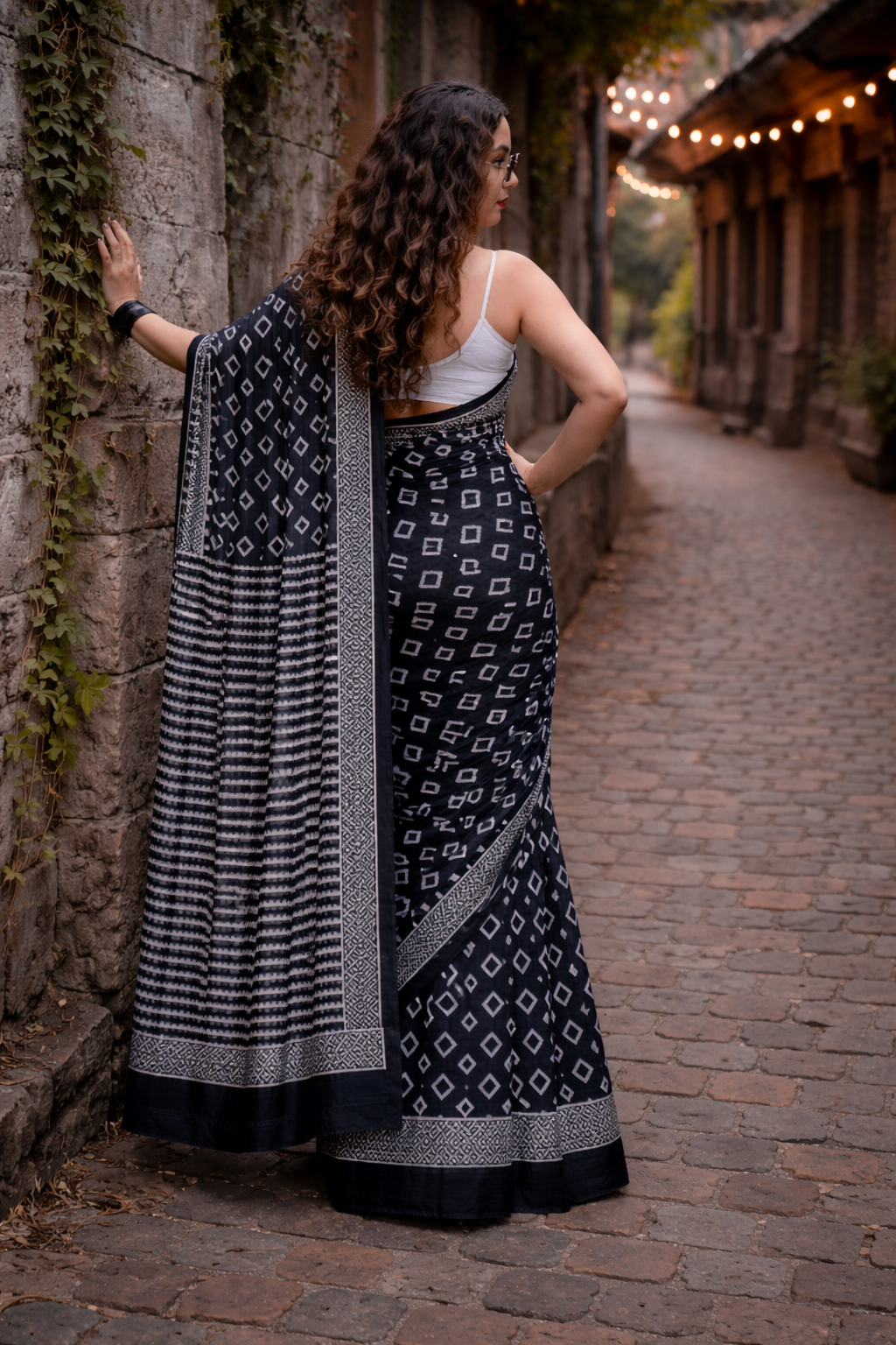 Midnight Noir Linen Cotton Saree with Tribal Border