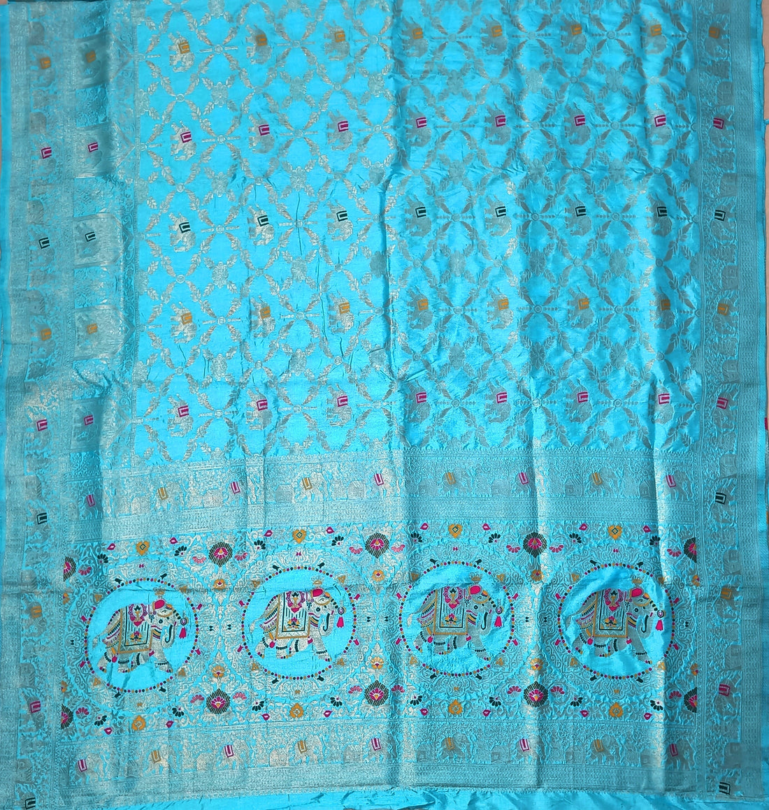 Royal Turquoise Dola Silk Saree with Traditional Elephant Woven Pallu