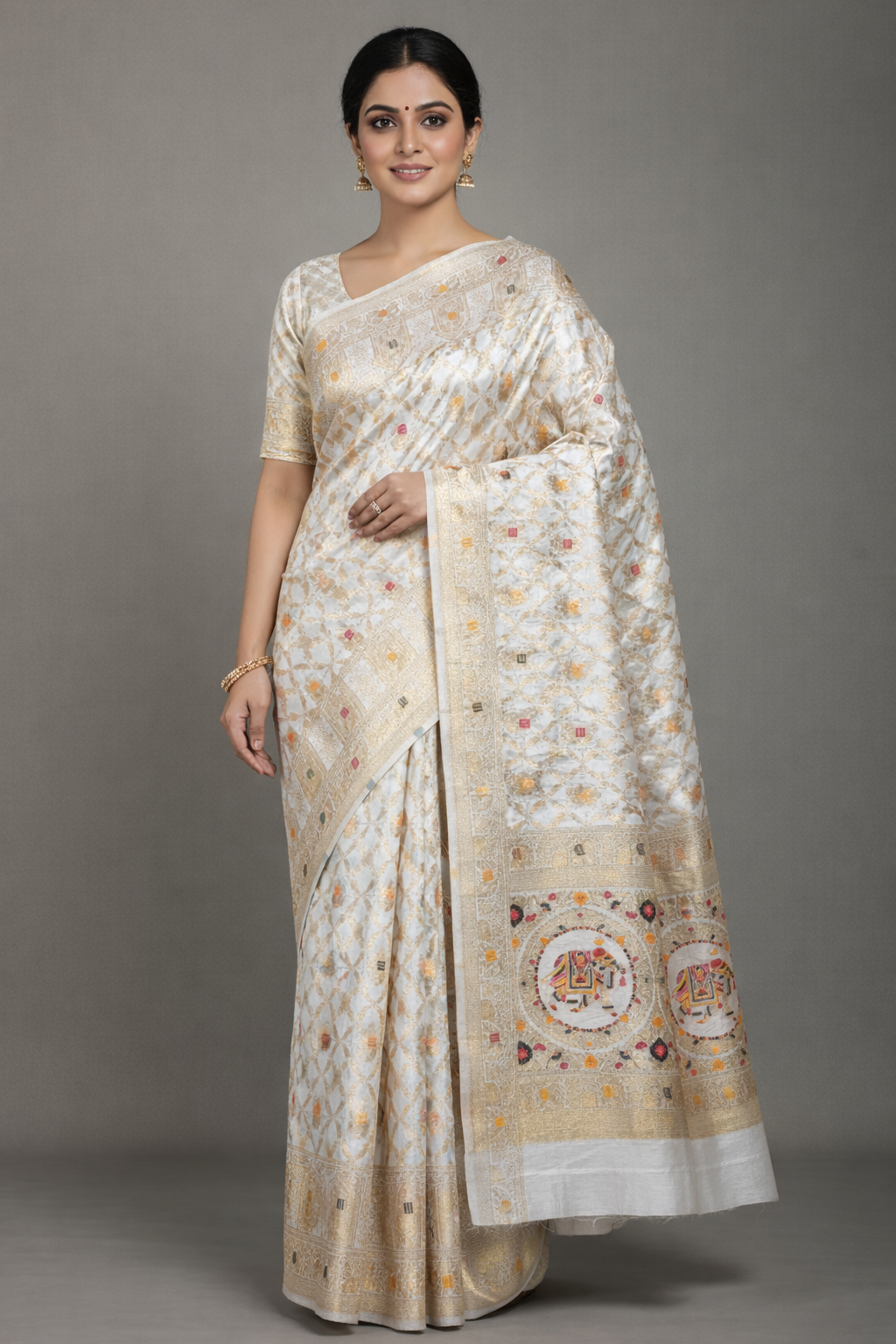 Off White Dola Silk Saree with Royal Elephant & Zari Woven Border