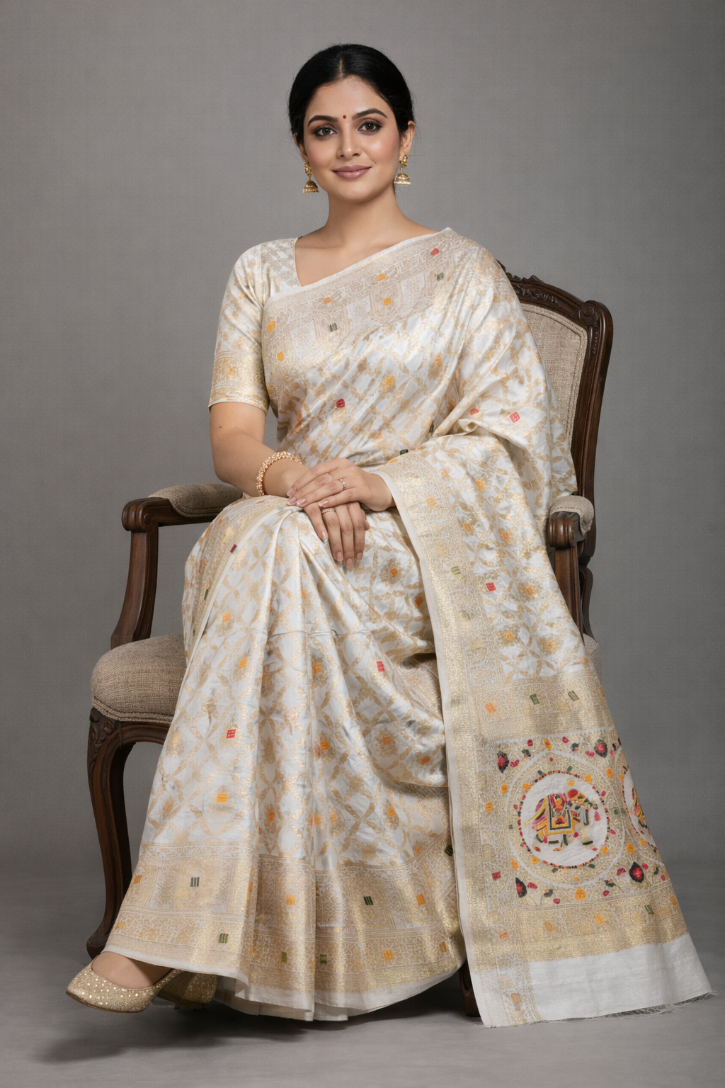 Off White Dola Silk Saree with Royal Elephant & Zari Woven Border