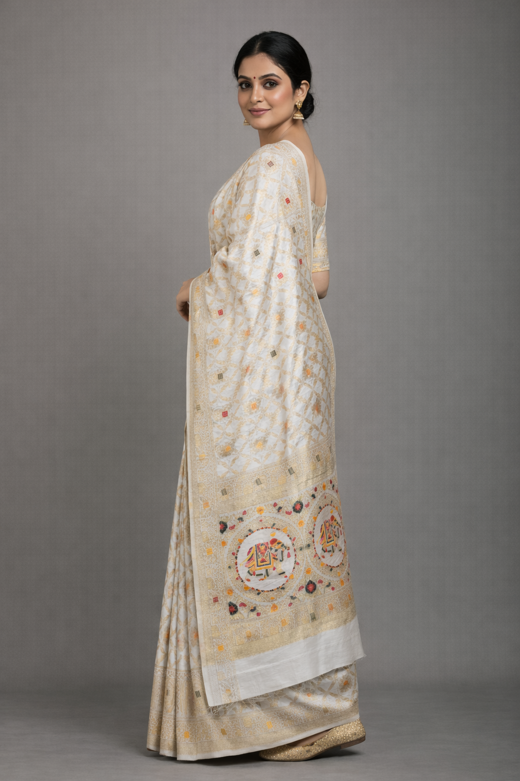 Off White Dola Silk Saree with Royal Elephant & Zari Woven Border