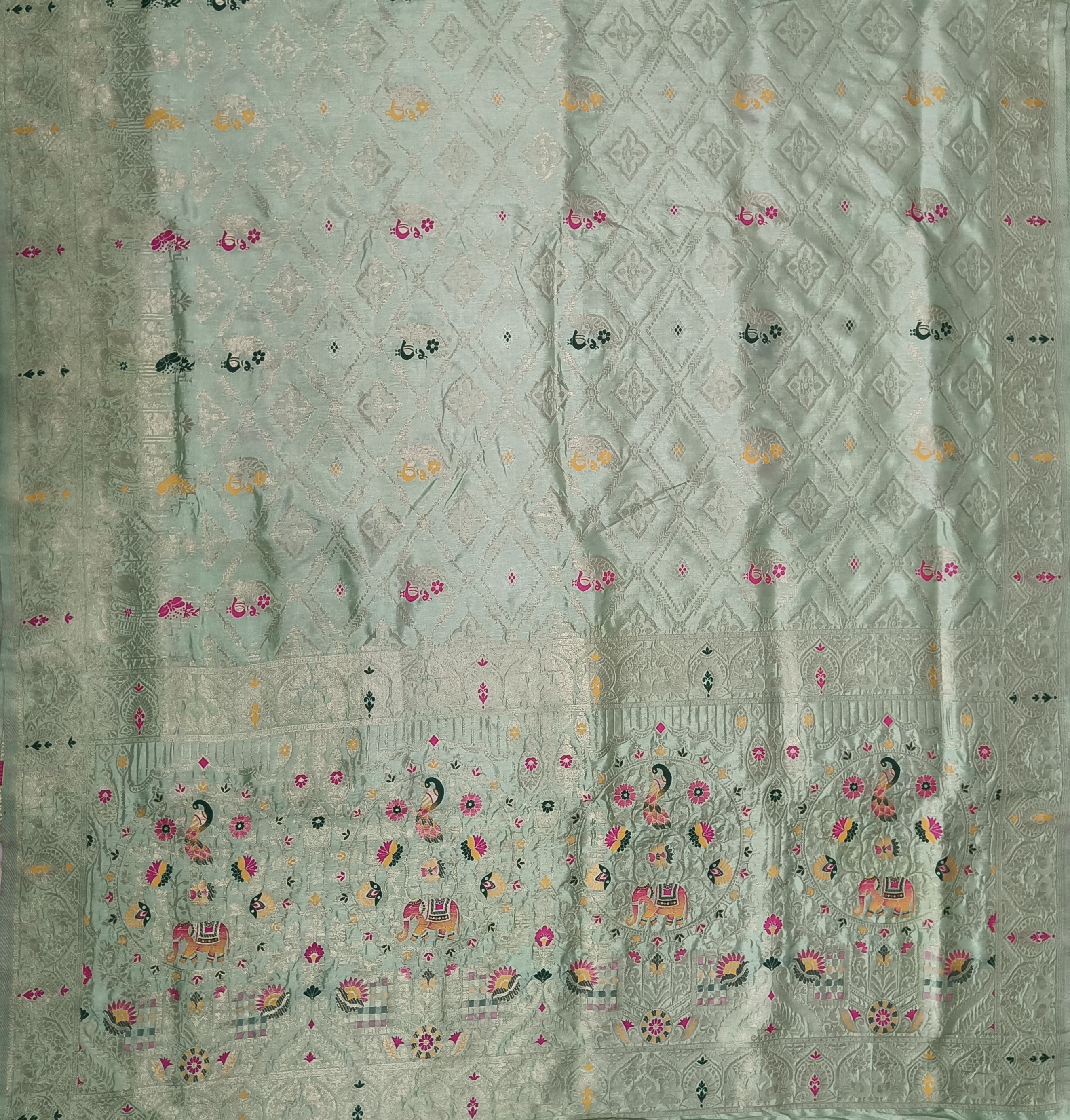 Elegant Pastel Pista Green Dola Silk Saree with Peacock & Elephant Woven Border