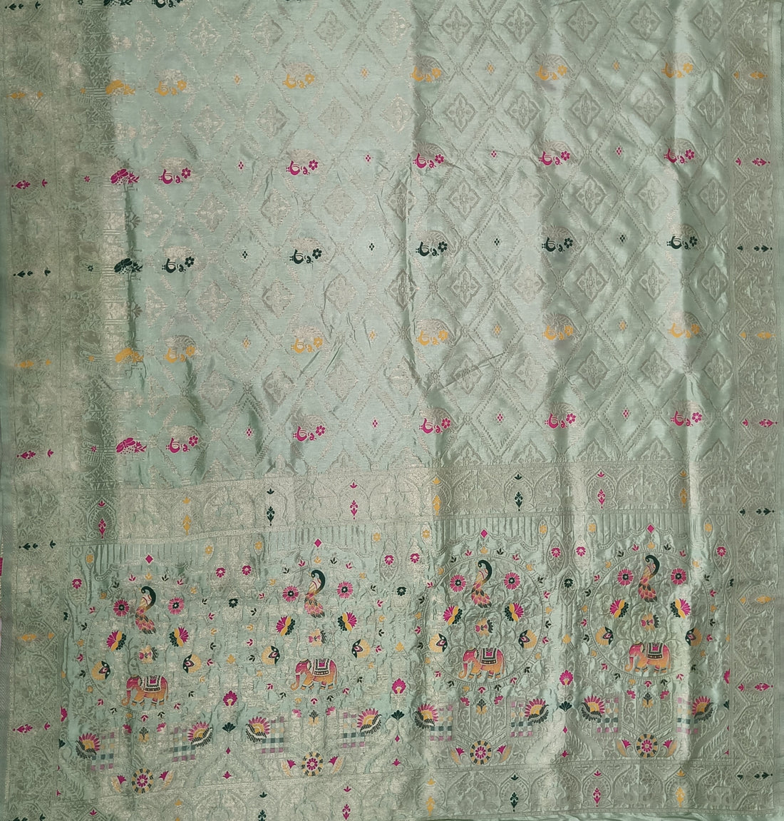 Elegant Pastel Pista Green Dola Silk Saree with Peacock & Elephant Woven Border