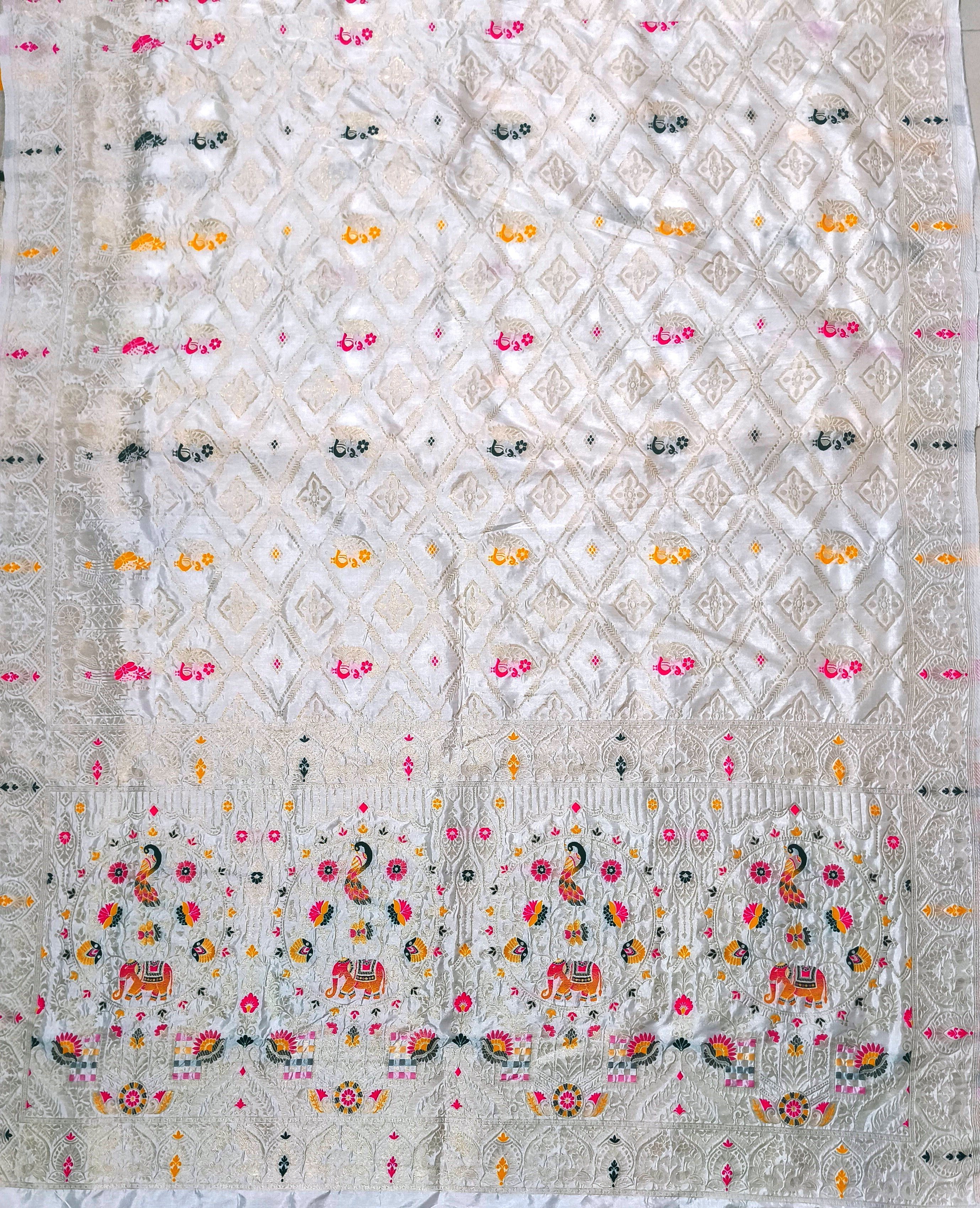 Elegant Off white Dola Silk Saree with Peacock & Elephant Woven Border