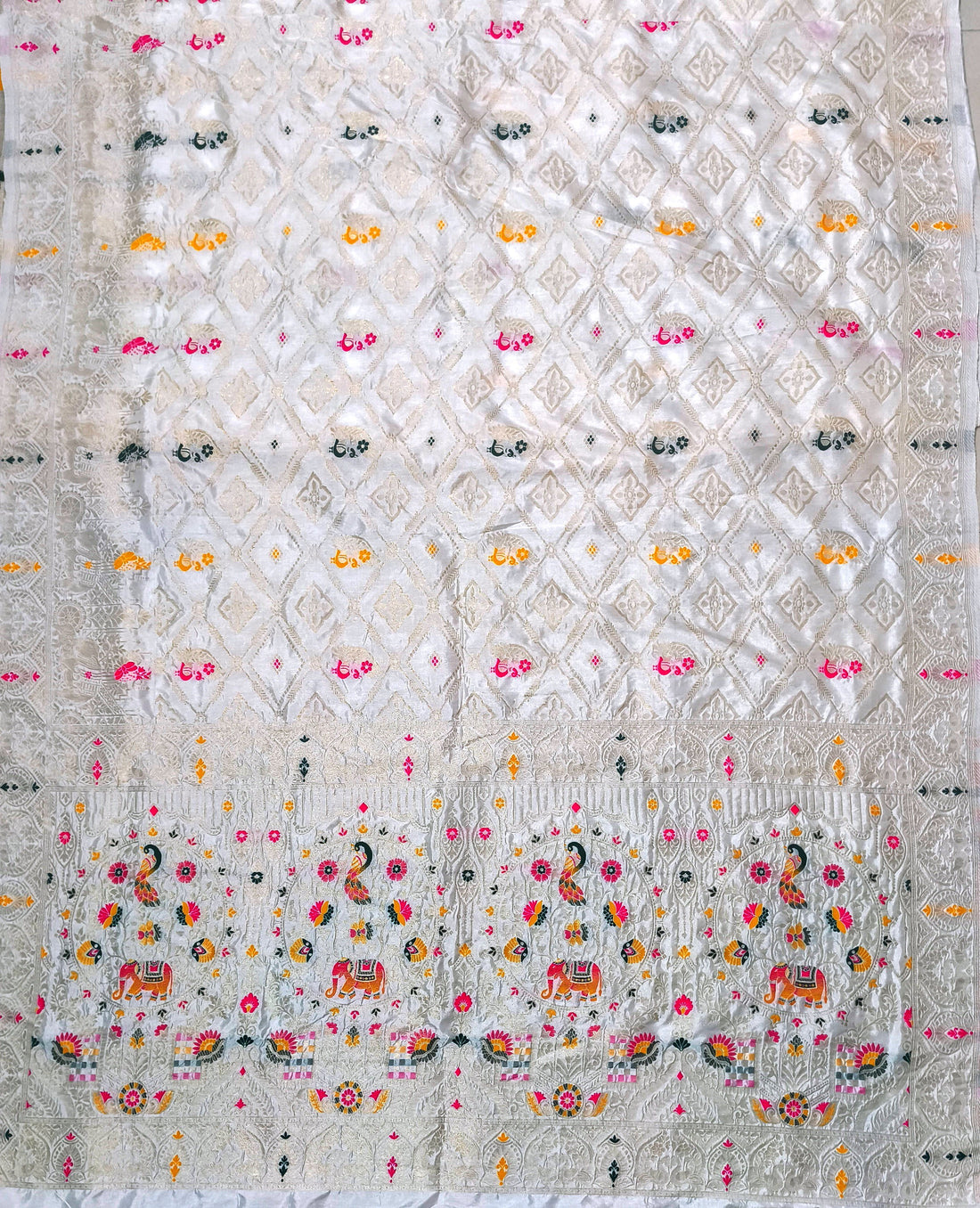 Elegant Off white Dola Silk Saree with Peacock & Elephant Woven Border