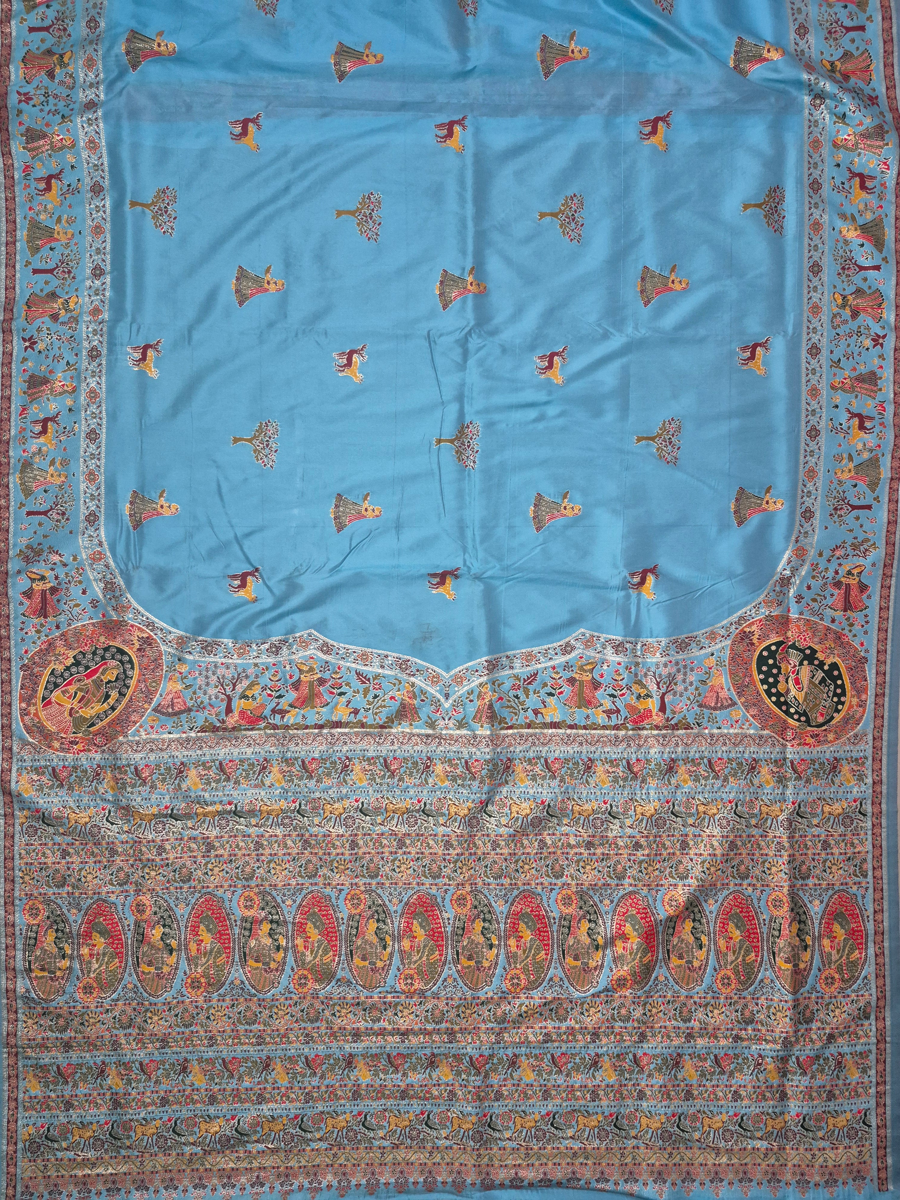 Sky Blue Pashmina Saree with Traditional Folk Border