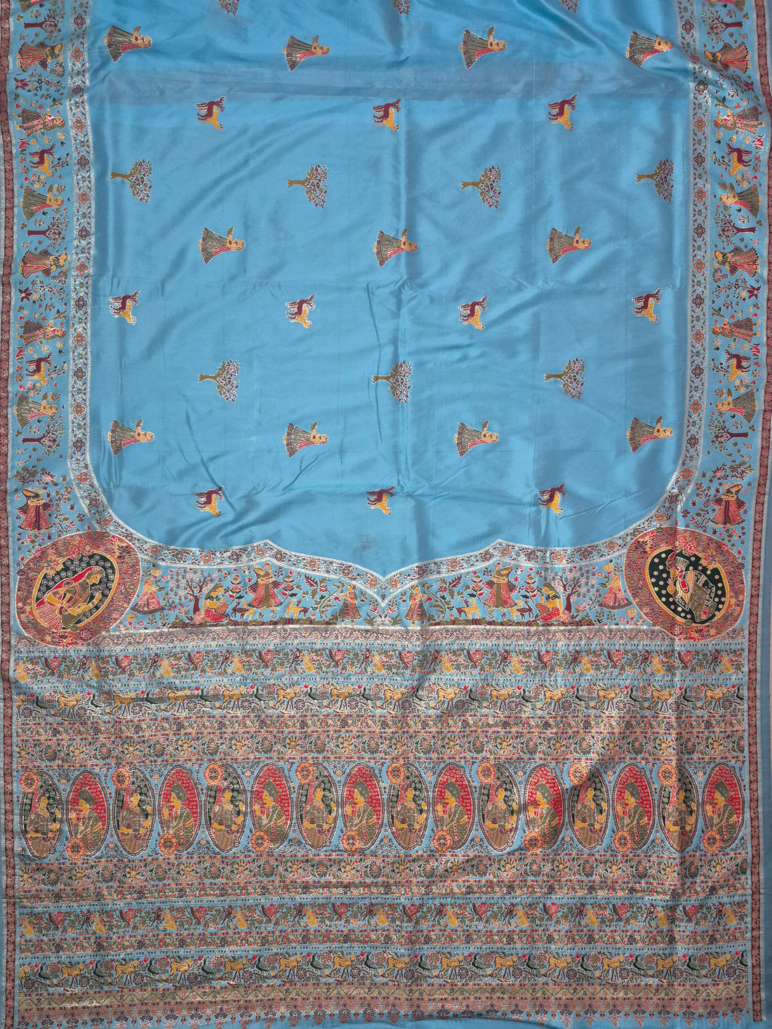 Sky Blue Pashmina Saree with Traditional Folk Border
