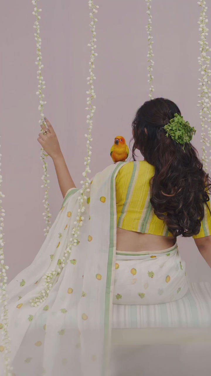 Elegant light yellow Linen Cotton Saree with Yellow Floral Print